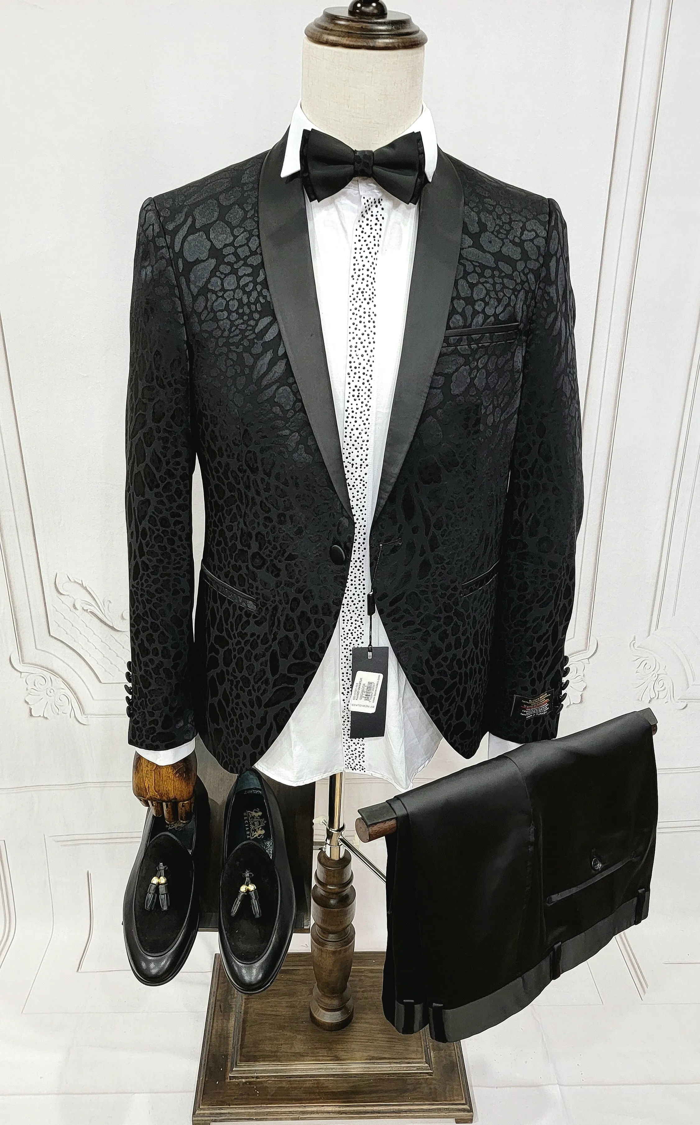Classic Single Button Two-Piece Tuxedo Suit with leopard patched premium material and a Satin Lapel, matching bow tie and Black Pants.