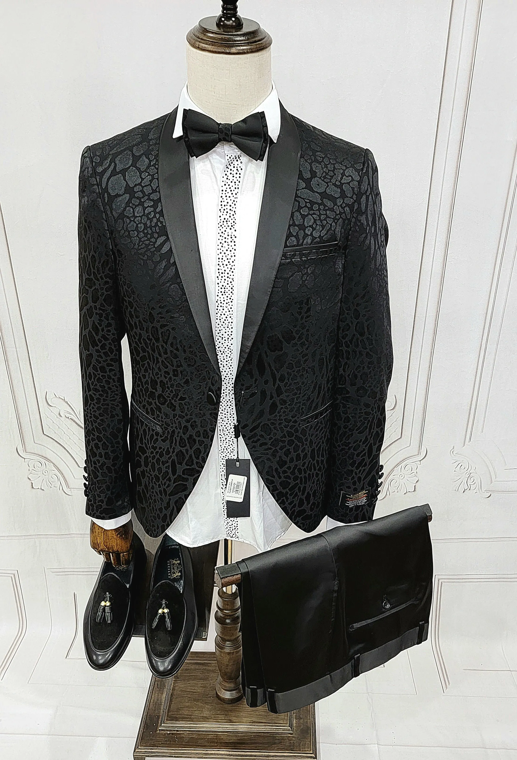 Classic Single Button Two-Piece Tuxedo Suit with leopard patched premium material and a Satin Lapel, matching bow tie and Black Pants.