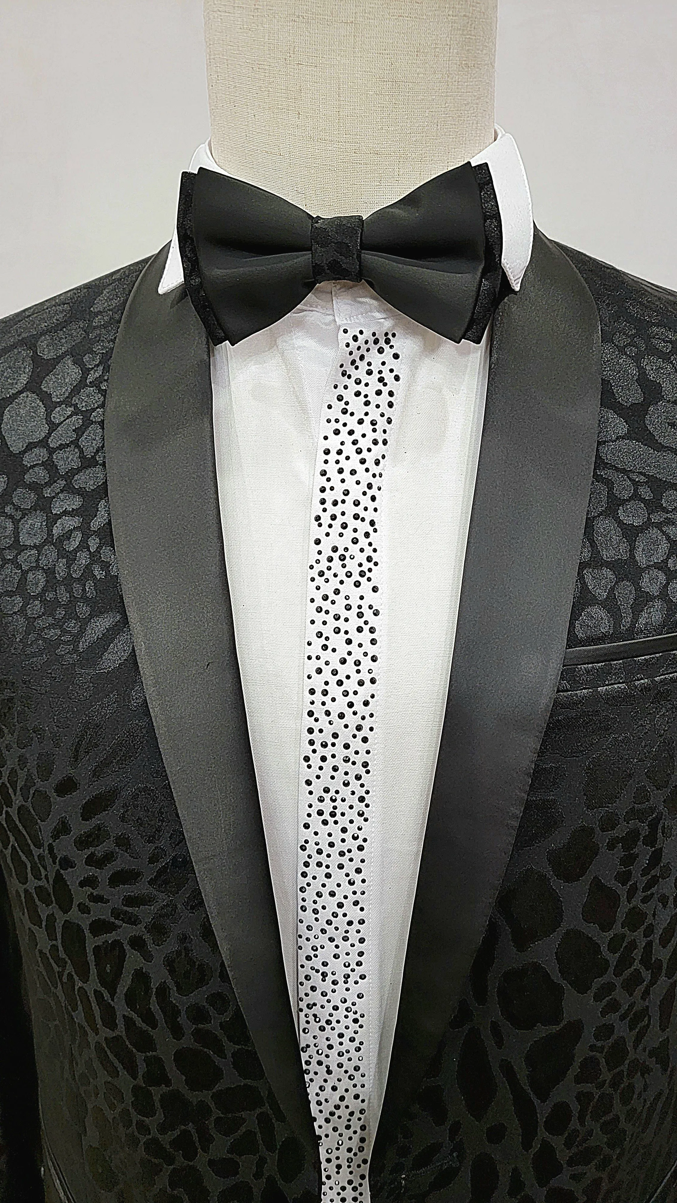 Classic Single Button Two-Piece Tuxedo Suit with leopard patched premium material and a Satin Lapel, matching bow tie and Black Pants.