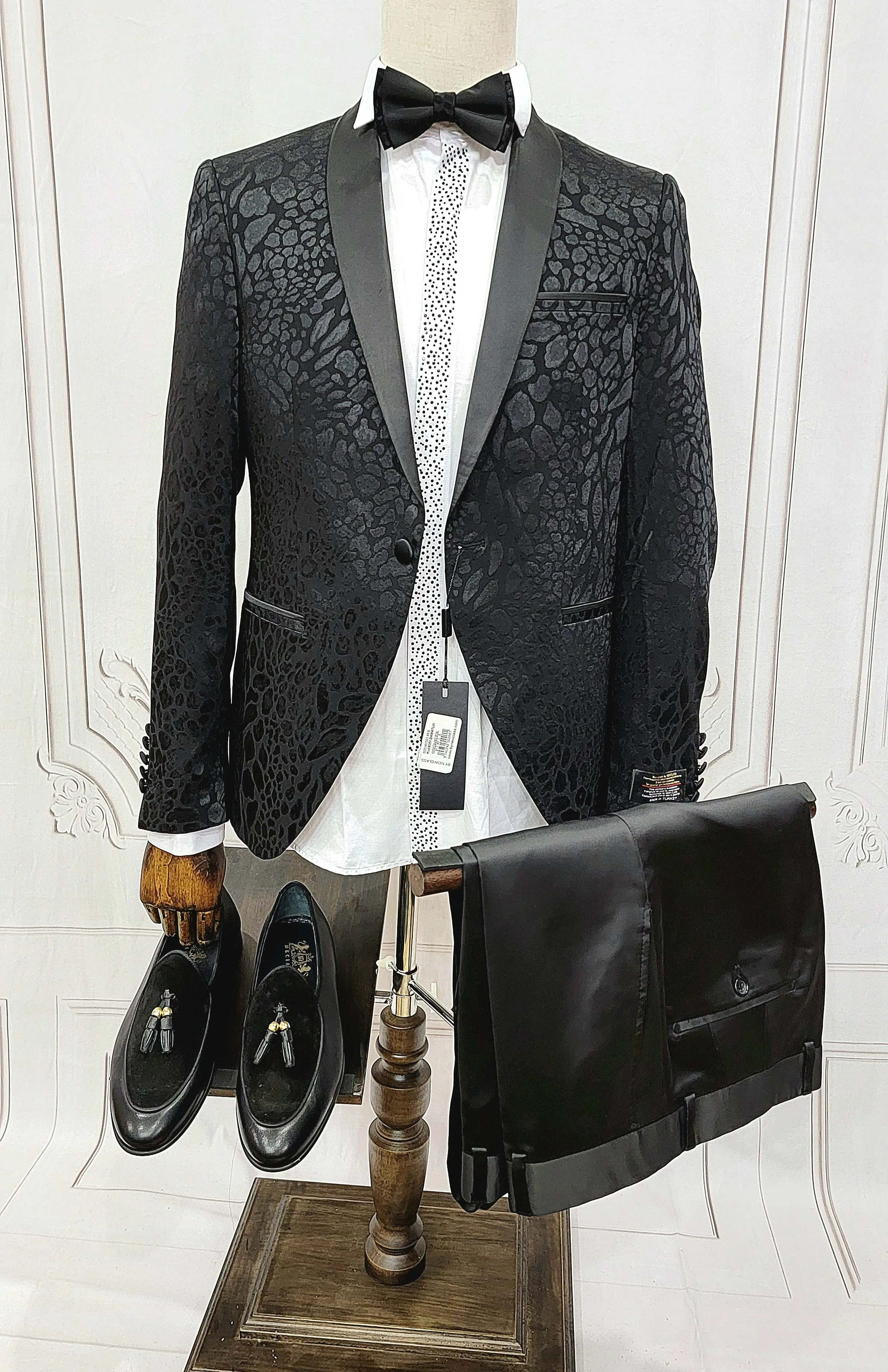 Classic Single Button Two-Piece Tuxedo Suit with leopard patched premium material and a Satin Lapel, matching bow tie and Black Pants.