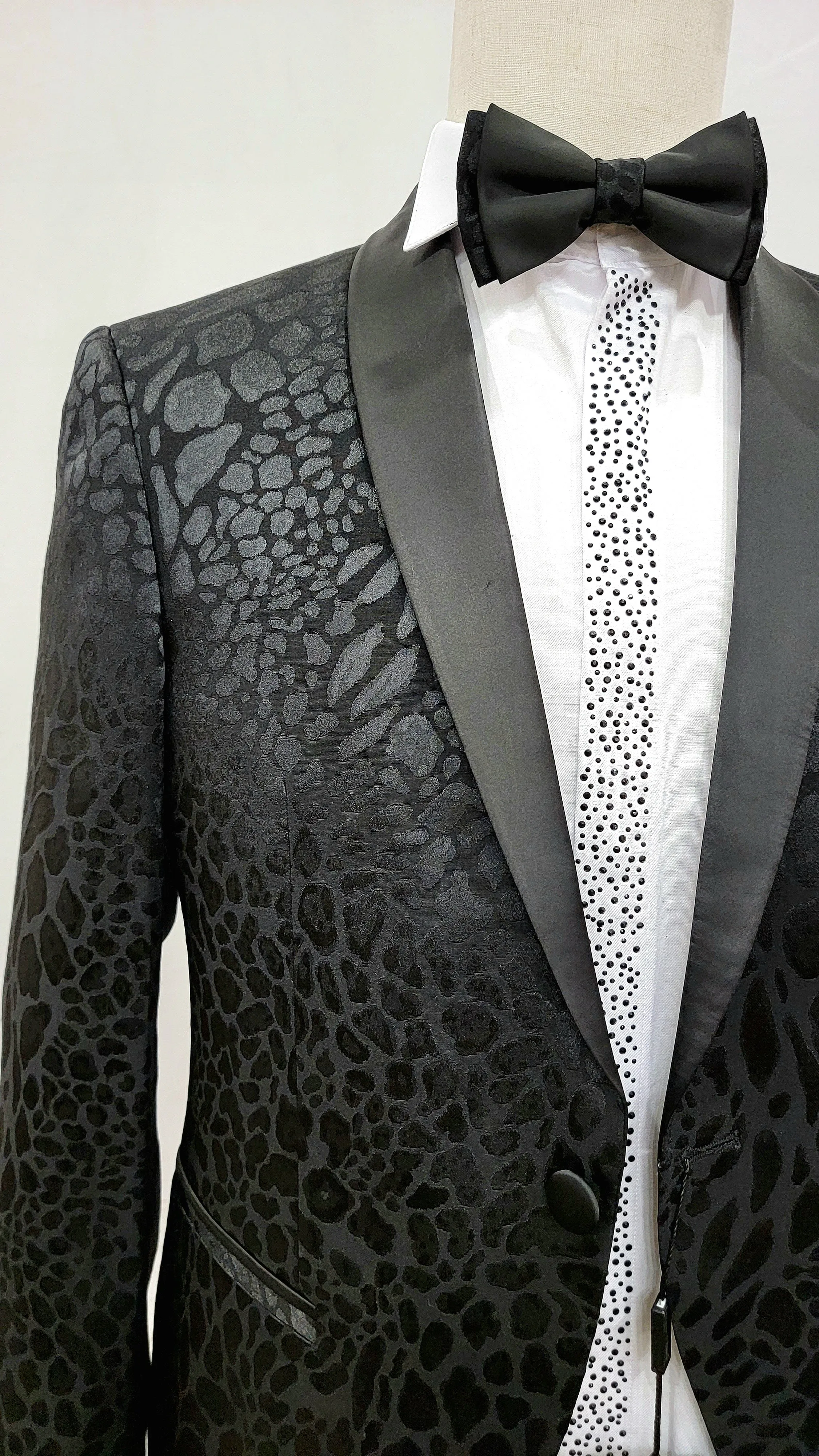 Classic Single Button Two-Piece Tuxedo Suit with leopard patched premium material and a Satin Lapel, matching bow tie and Black Pants.