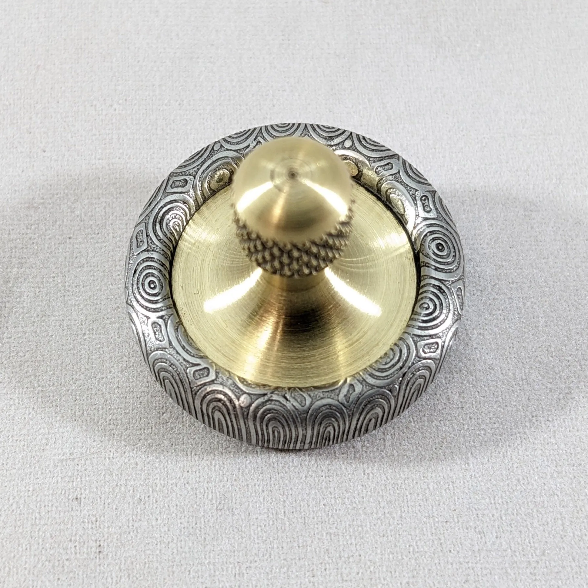 Dynamini - Damasteel and Brass