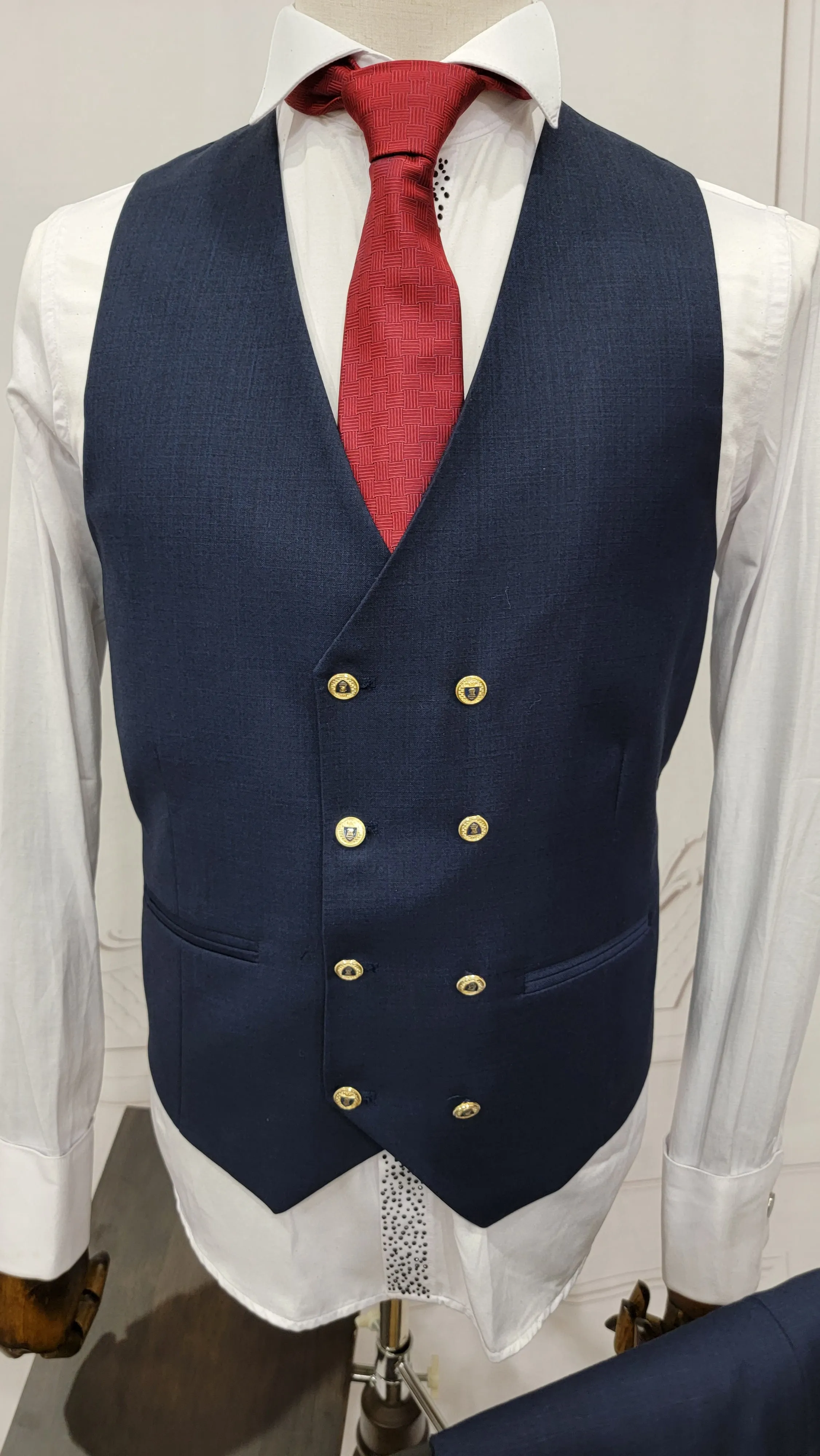 Three Pieces Classic Suit with Double Breasted Style Vest and gold Buttons.