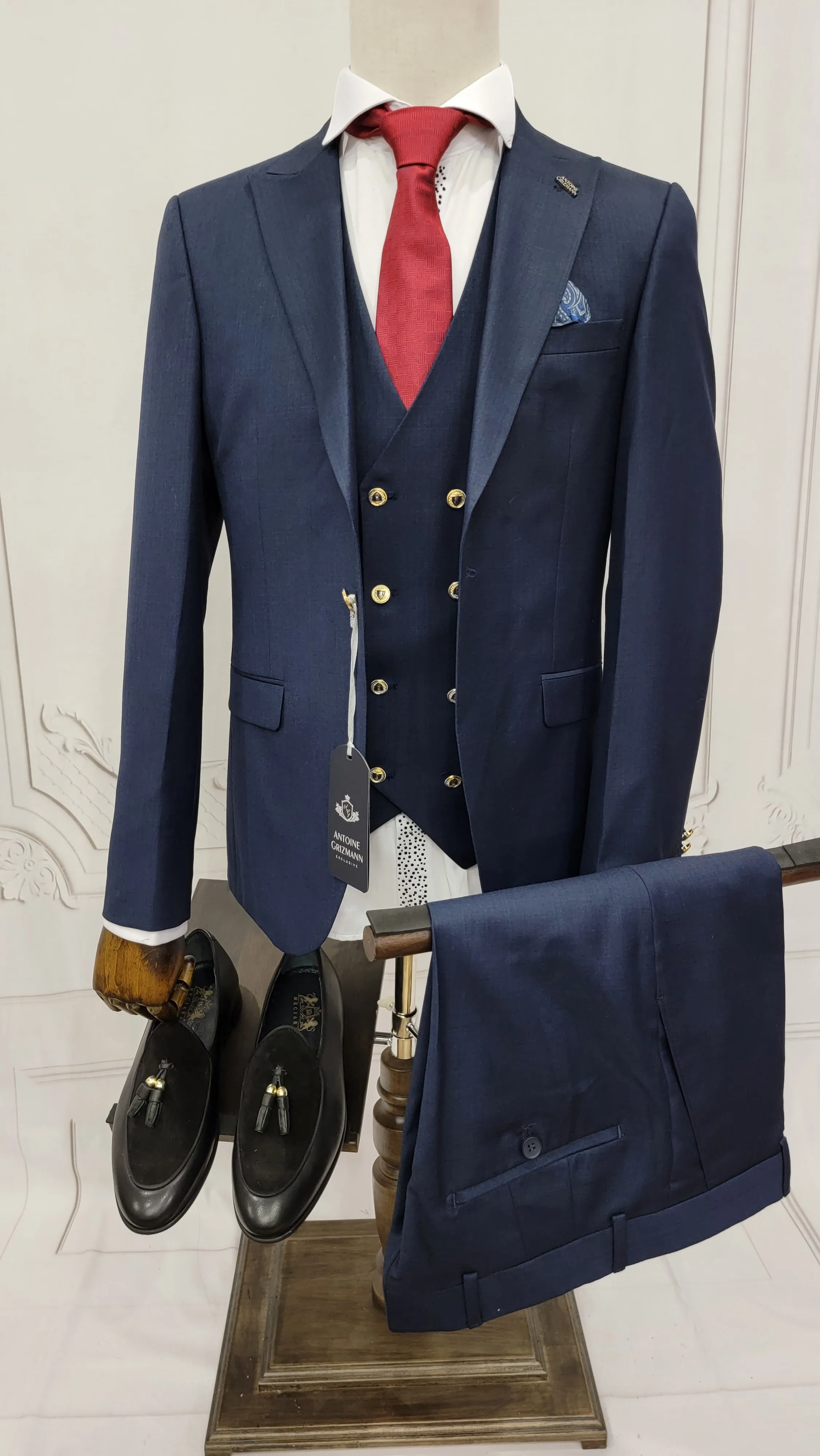 Three Pieces Classic Suit with Double Breasted Style Vest and gold Buttons.